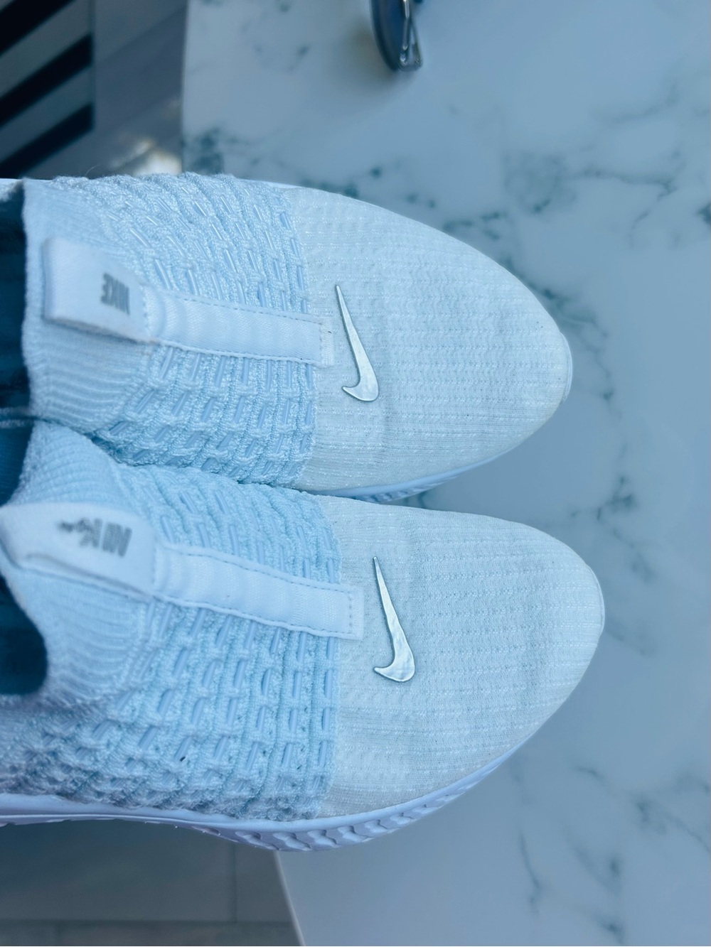 Nike Ladies Phantom white Slip-On Fly Knit Sneakers with Silver Swoosh